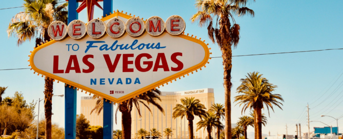 Las Vegas welcome sign on a sunny day with palm trees - Opiniion: Resident Insight that Drives Property Success